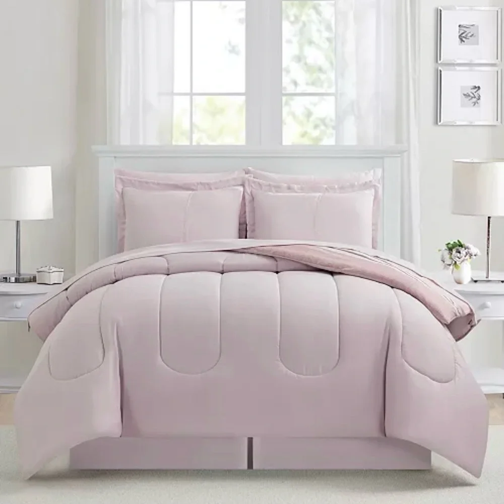 Reversible Color block w a seaside vibe, the Aiden comforter Set.